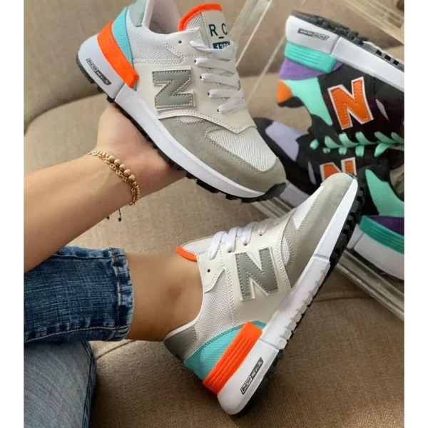 Zapatilla NB gris naranja unisex